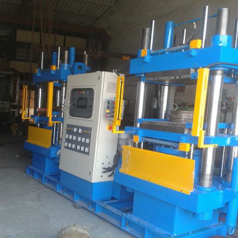 FULLY AUTOMATIC COMPRESSION TYPE RUBBER MOULDING MACHINES