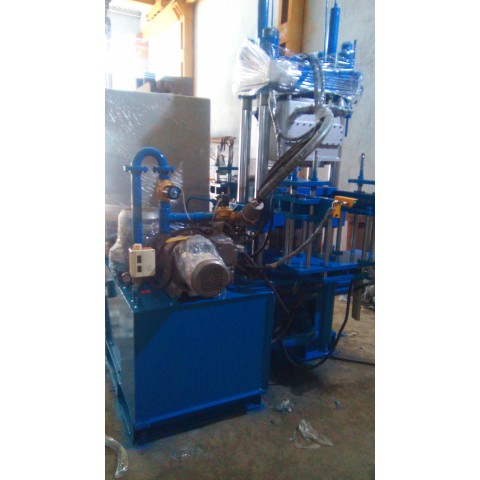 VACUUM COMPRESSION RUBBER MOULDING MACHINES WITH MOULD HANDLING SYSTEMS